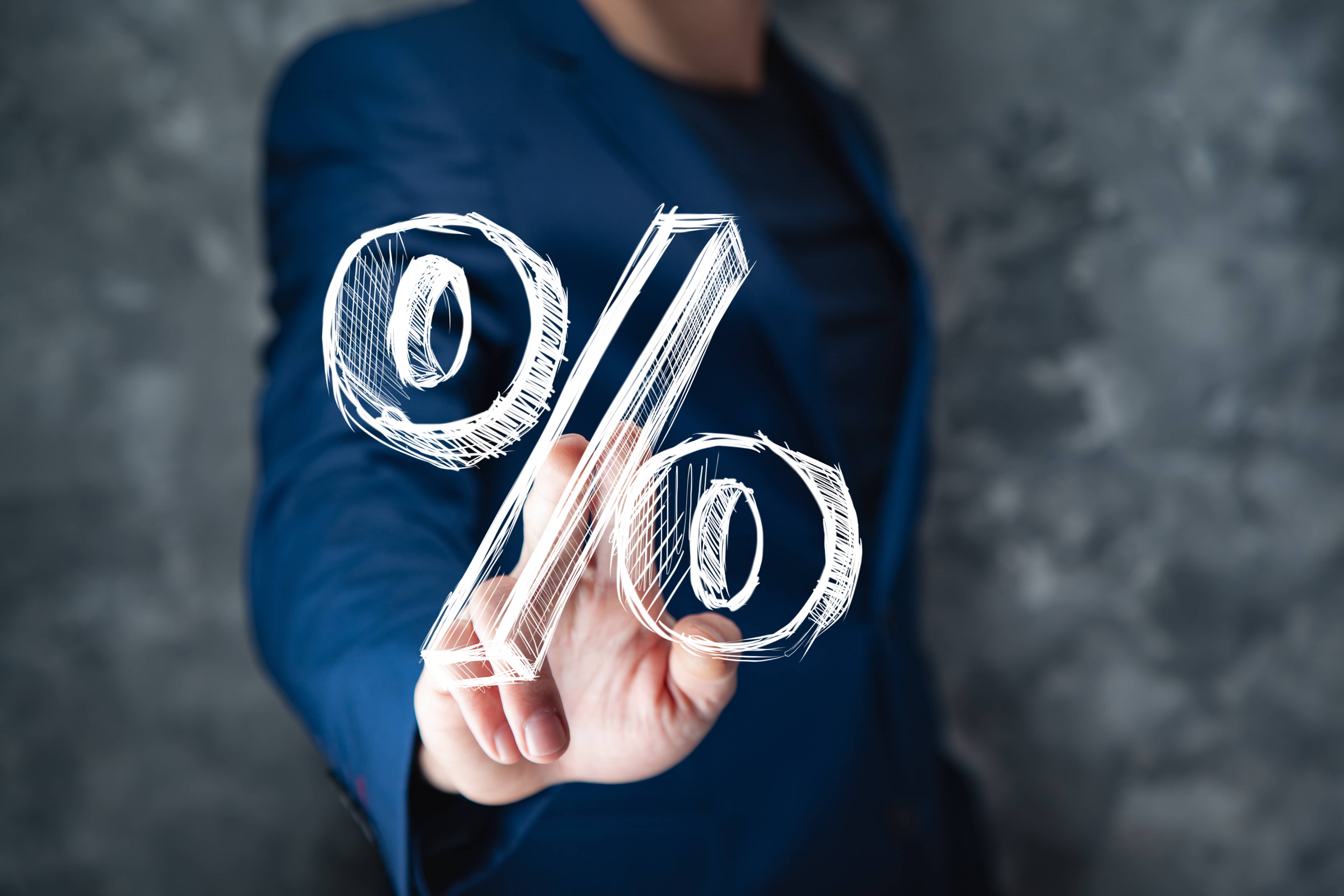 young business man touching percent screen